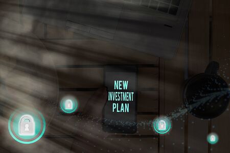 Handwriting text New Investment Plan. Conceptual photo financial goals and objectives with your...