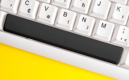 Different Colored Keyboard key With Accessories Arranged On Empty copy spaceの写真素材