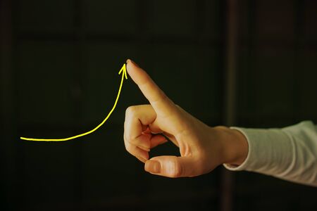 Digital Arrowhead Curve Rising Upward Denoting Growth Development Conceptの写真素材