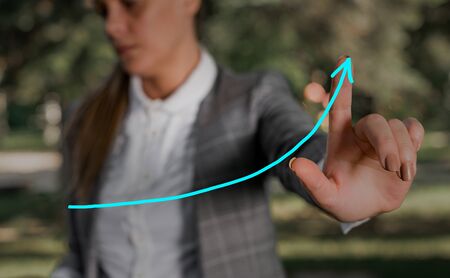 Digital Arrowhead Curve Rising Upward Denoting Growth Development Conceptの写真素材