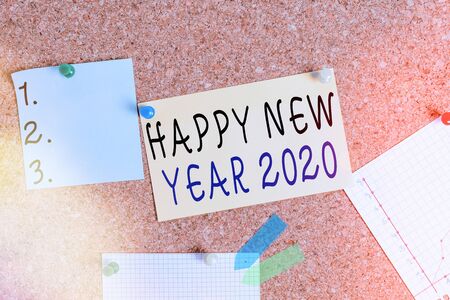 Word writing text Happy New Year 2020. Business photo showcasing celebration of the beginning of the calendar year 2020 Corkboard color size paper pin thumbtack tack sheet billboard notice boardの写真素材