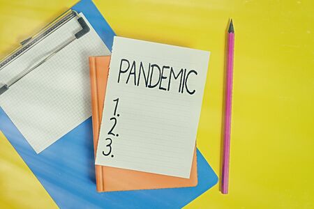 Handwriting text writing Pandemic. Conceptual photo occurring over a wide area affecting high...