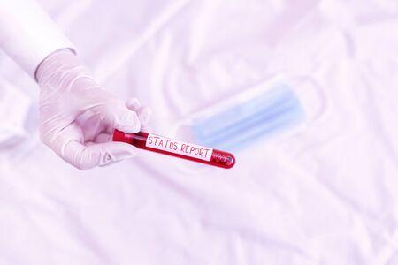 Handwriting text Status Report. Conceptual photo summarizes the particular situation as of a stated...