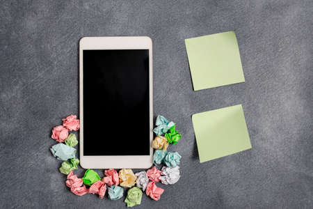 Paper Accesories With Digital Smartphone Arranged On Different Background
