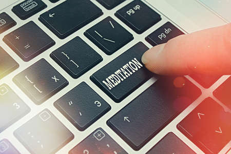 Word writing text Meditation. Business photo showcasing achieve a mentally clear and emotionally calm and stable state Pc keyboard key with pointing finger above background copy spaceの写真素材