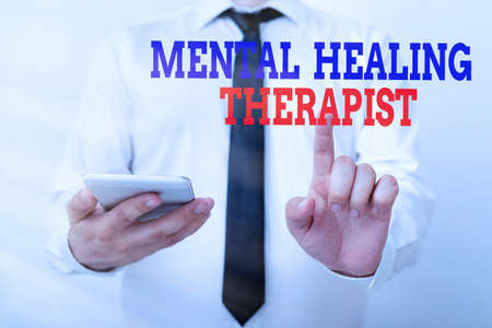 Conceptual hand writing showing Mental Healing Therapist. Concept meaning helping an individual...