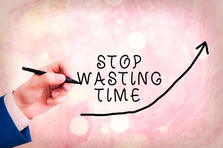 Handwriting text writing Stop Wasting Time. Conceptual photo Organizing Management Schedule lets do it Start Now digital arrowhead curve rising upward denoting growth development conceptの写真素材