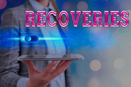 Text sign showing Recoveries. Business photo showcasing process of regaining possession or control...