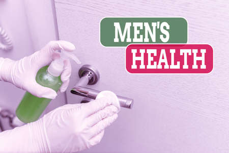 Conceptual hand writing showing Mens Health. Concept meaning state of complete and social wellbeing as experienced by men Contaminated electronic gadgets controlled by disinfectantの写真素材