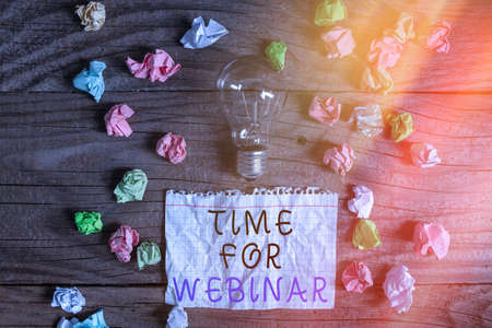 Writing note showing Time For Webinar. Business concept for elearning, web conference, webcasting, realtime online collaboration Realistic colored vintage light bulbs, idea sign solutionの写真素材