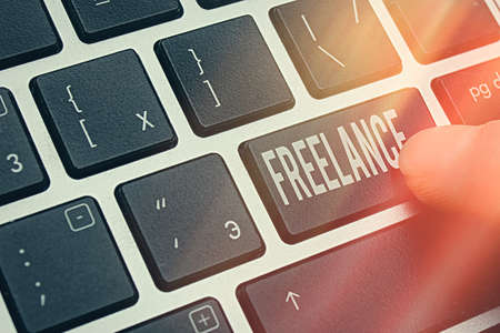 Handwriting text writing Freelance. Conceptual photo working at different firms rather than being...