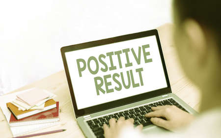 Conceptual hand writing showing Positive Result. Concept meaning shows that an individual has the disease, condition, or biomarker Modern gadgets white screen under colorful bokeh backgroundの写真素材