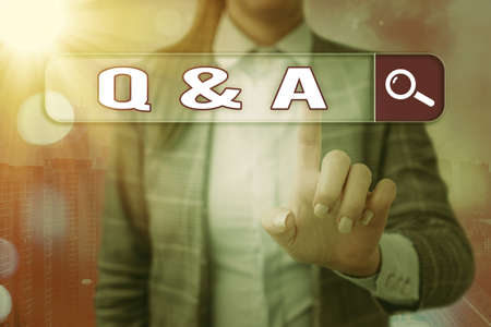 Conceptual hand writing showing Q And A. Concept meaning in which an individual asks questions and...