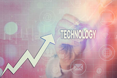 Writing note showing Technology. Business concept for use of scientific knowledge for practical purposes in industry Arrow symbol going upward showing significant achievementの写真素材