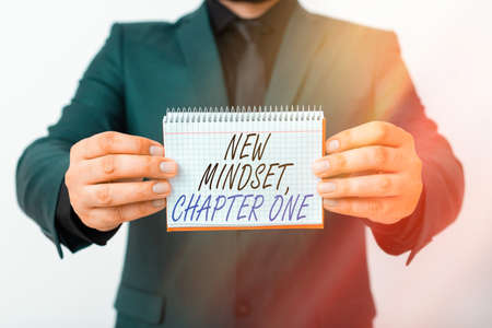 Writing note showing New Mindset, Chapter One. Business concept for change on attitudes and thinking Improve hard work Model displaying different empty color notepad mock-up for writing ideaの写真素材