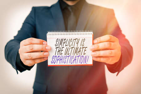 Writing note showing Simplicity Is The Ultimate Sophistication. Business concept for simplify presentations best result Model displaying different empty color notepad mock-up for writing ideaの写真素材
