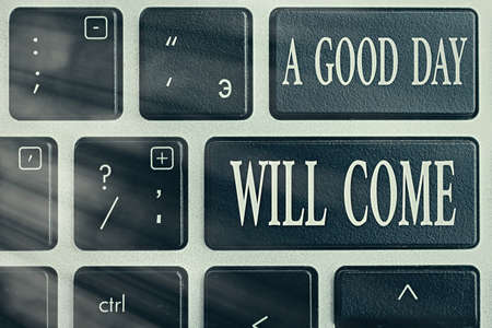 Text sign showing A Good Day Will Come. Business photo showcasing Stay motivated Thinking positively Be inspired Pc keyboard key with empty note paper above background copy spaceの写真素材