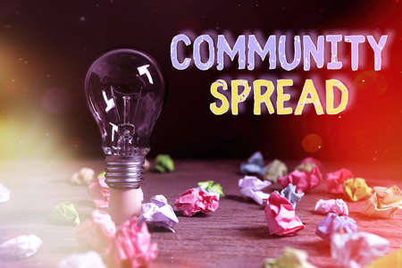 Writing note showing Community Spread. Business concept for dissemination of a highlycontagious...