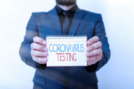 Handwriting text writing Coronavirus Testing. Conceptual photo Collection of samples from a viable patient to identify SARSCoV2 Model displaying different empty color notepad mock-up for writing ideaの写真素材