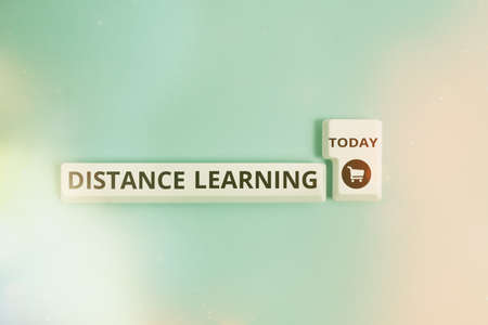 Writing note showing Distance Learning. Business concept for educational lectures broadcasted over the Internet remotely Pc keyboard key with empty note paper above background copy spaceの写真素材