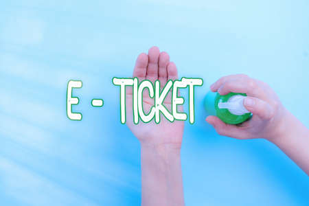 Handwriting text E ticket. Conceptual photo flight booking for which the details are registered...