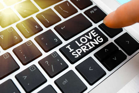 Text sign showing I Love Spring. Business photo text telling why having a strong affection to this season Pc keyboard key with pointing finger above background copy spaceの写真素材