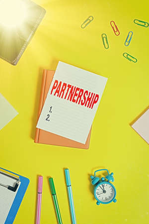 Conceptual hand writing showing Partnership. Concept meaning business type in which two or more...