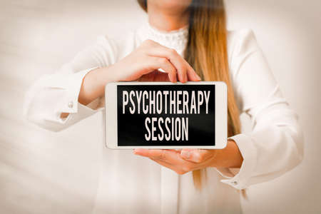 Text sign showing Psychotherapy Session. Business photo showcasing series of meetings in treating mental health problems Model displaying black screen modern smartphone mock-up for personal interestの写真素材