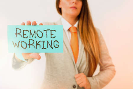 Conceptual hand writing showing Remote Working. Concept meaning style that allows professionals to work outside of an office Displaying different color notes for emphasizing contentの写真素材