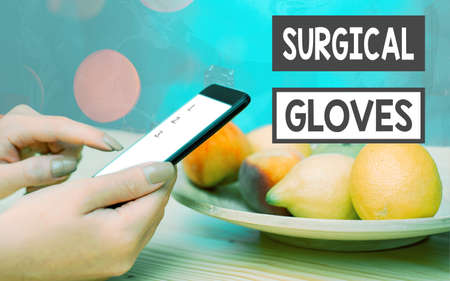 Handwriting text Surgical Gloves. Conceptual photo to protect from the exposure to infectious...