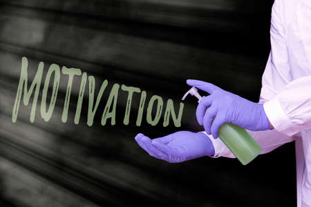 Handwriting text writing Motivation. Conceptual photo the general desire or willingness of someone to do something Displaying Empty Sticker Paper Accessories Smartphone With Medical Gloves Onの写真素材