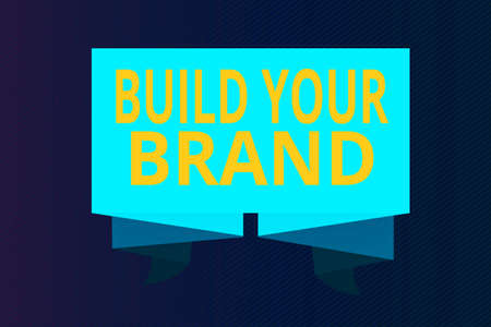 Word writing text Build Your Brand. Business photo showcasing enhancing brand equity using advertising campaigns Ribbon Sash Folded and Pleated Decorative Banner Strip corrugated Ribandの写真素材