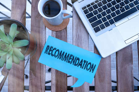 Word writing text Recommendation. Business photo showcasing something that recommends or expresses commendation Paper accesories with digital smartphone arranged on different backgroundの写真素材