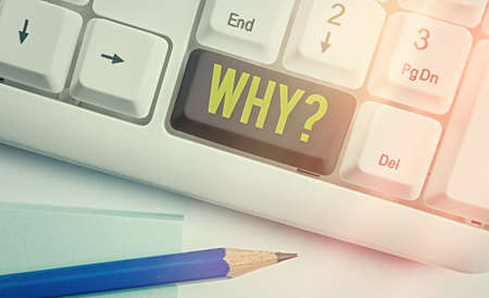 Text sign showing Why question. Business photo text the cause, reason, or purpose for which you want to know the reason Different colored keyboard key with accessories arranged on empty copy spaceの写真素材