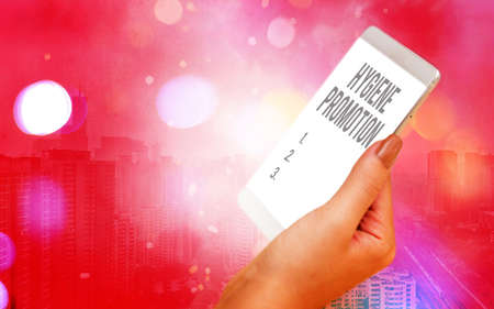 Word writing text Hygiene Promotion. Business photo showcasing systematic program to prevent related disease with sanitation Modern gadgets with white display screen under colorful bokeh backgroundの写真素材