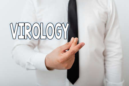 Text sign showing Virology. Business photo showcasing branch of science dealing with the variety of viral agents and disease Model with pointing hand finger symbolizing navigation progress growthの写真素材