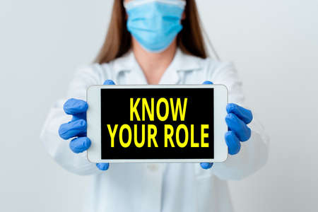 Handwriting text Know Your Role. Conceptual photo end acting outside who you actually are Play your position Laboratory technician featuring empty sticker paper accessories smartphoneの写真素材