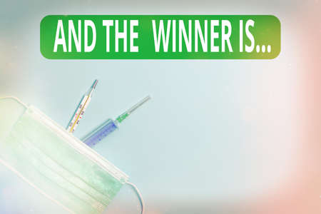 Handwriting text And The Winner Is. Conceptual photo announcing an individual or thing that wins...