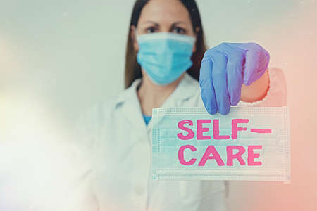 Conceptual hand writing showing Self Care. Concept meaning the practice of taking action to improve one s is own health Laboratory blood test sample for medical diagnostic analysisの写真素材