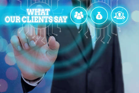 Writing note showing What Our Clients Say. Business concept for testimonials or feedback of a client...