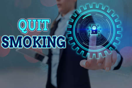Conceptual hand writing showing Quit Smoking. Concept meaning the process of discontinuing or...