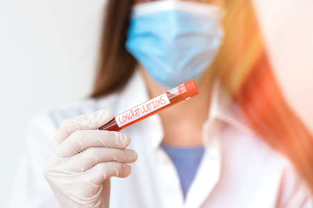 Text sign showing Congratulations. Business photo text a congratulatory expression usually used in plural form Laboratory blood test sample shown for medical diagnostic analysis resultの写真素材