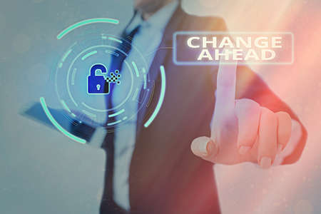 Conceptual hand writing showing Change Ahead. Concept meaning to replace with or exchange for another Become different Graphics padlock for web data security application systemの写真素材