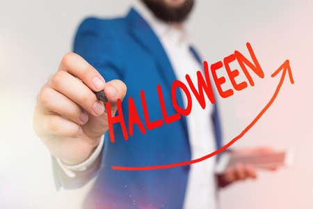 Writing note showing Halloween. Business concept for October 31 observed especially with dressing up in disguise Digital arrowhead curve denoting growth development conceptの写真素材