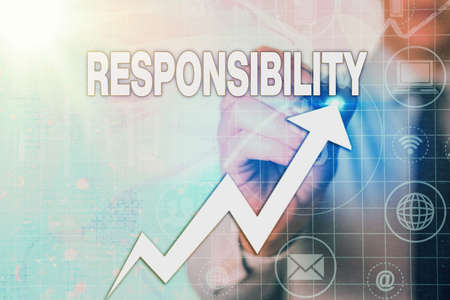 Writing note showing Responsibility. Business concept for state of being responsible, something for one is responsible Arrow symbol going upward showing significant achievementの写真素材