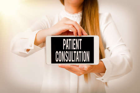 Text sign showing Patient Consultation. Business photo showcasing examining discuss a patient and his or her condition Model displaying black screen modern smartphone mock-up for personal interestの写真素材