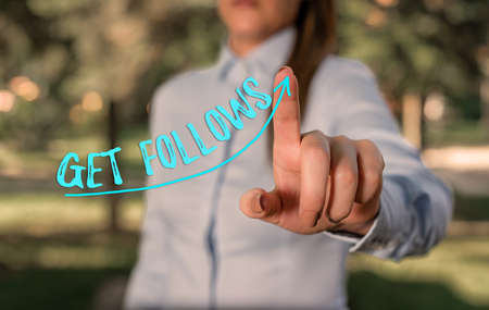 Writing note showing Get Follows. Business concept for an individual who imitates copies or takes as model ideal an individual Digital arrowhead curve denoting growth development conceptの写真素材