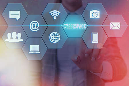 Writing note showing Cyberspace. Business concept for the online world of computer networks and especially the Internet Grids and different icons latest digital technology conceptの写真素材