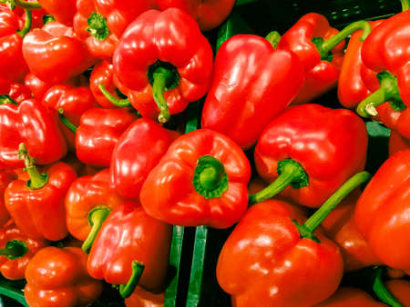 red bell peppers in the supermarket, vegetables backgroundの写真素材