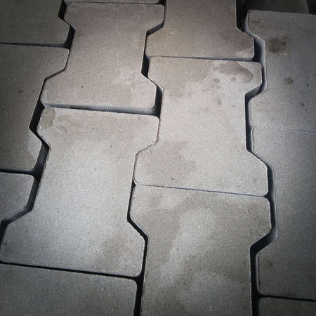 pavement rocks, stones or cobblestone blocks, cement background, pavementの写真素材